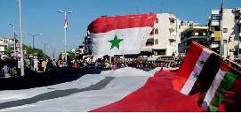 Latakia , streets , Syrian , national , banners 