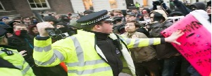 UK police, Brighton, protesters, universities, Woolford,  David Cameron
